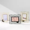 Rama foto metalica Navaris, 24x19 cm, design 3D, pentru poze 10x15, negru, MDF/sticla/metal